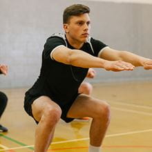 man doing squats