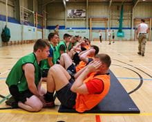 people doing sit ups