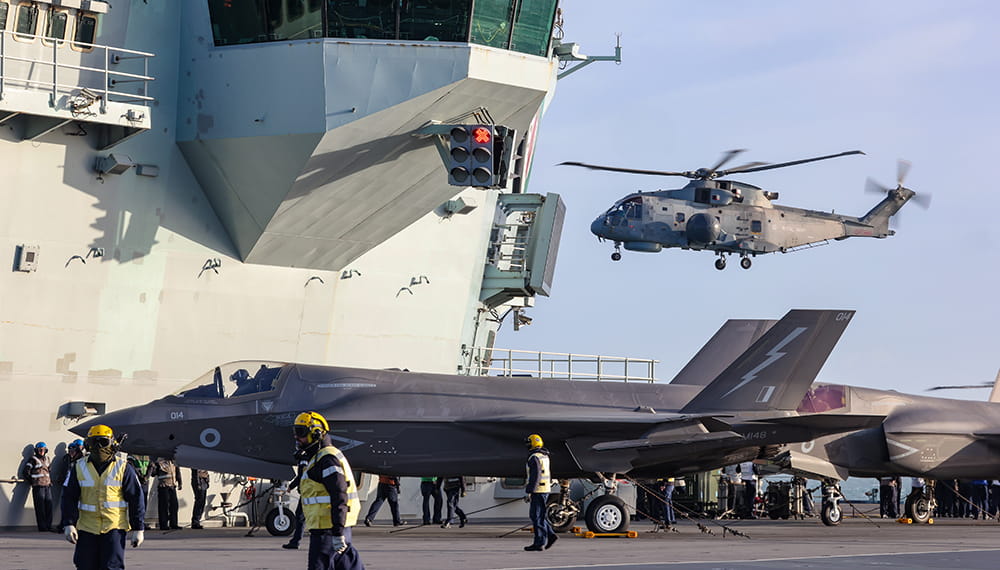 royal-navy-careers-services-03 Merlin Mk2 Helicopter takes off from the flight deck of HMS Queen Elizabeth for the final time during CSG21.