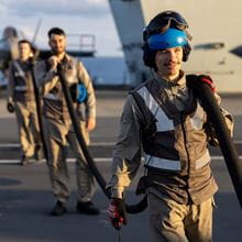 Navy personnel preparing for training exercise
