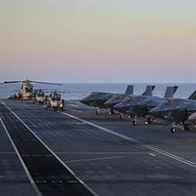 Aircrafts taking off from a carrier