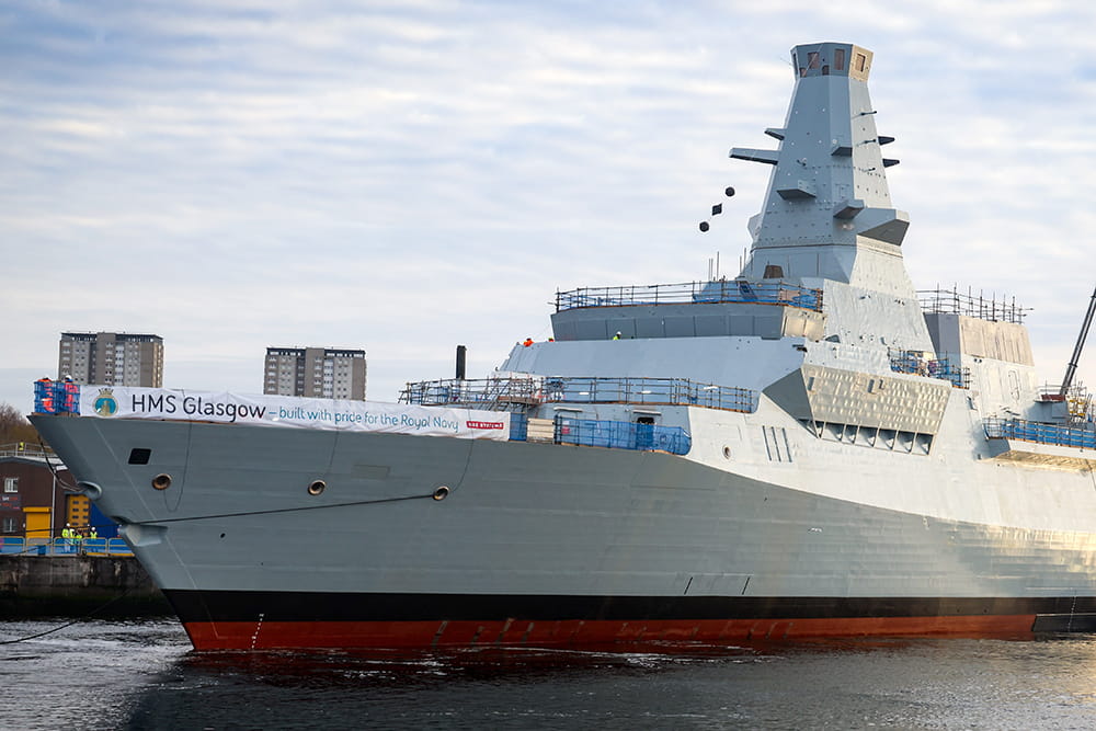 Royal-Navy-Equipment-City-Class-02-global-combat.jpg HMS Glasgow being towed an maneuvered by smaller tugboats