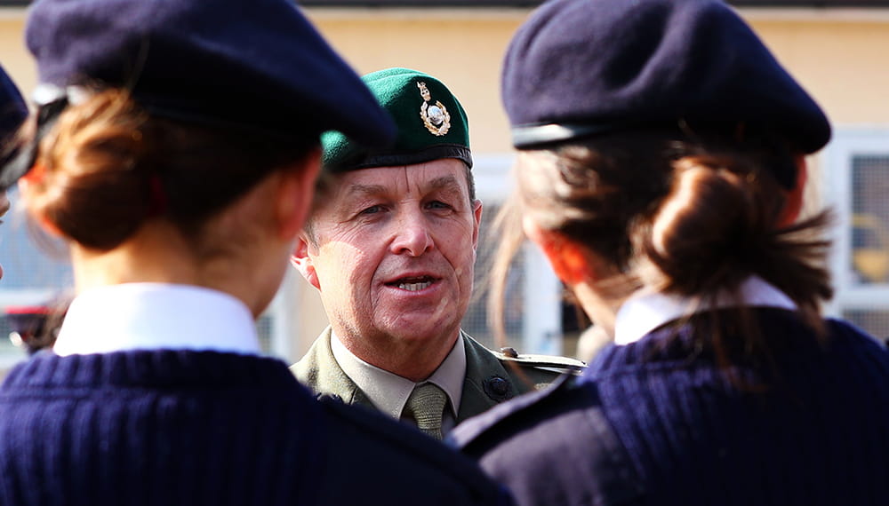 Royal-Navy-Organisation-cadets-and-youth-03-royal-marine-cadet.jpg Two Royal Navy cadets facing Army Major