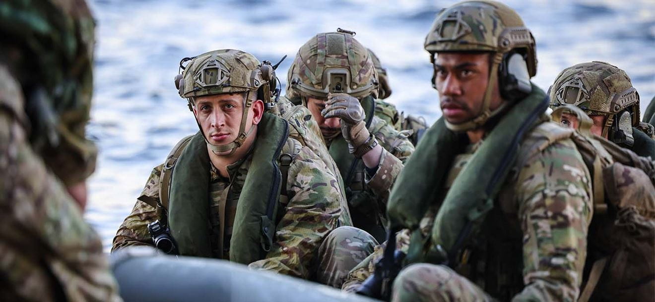 HMS Albion’s Royal Marines practice launching small boats from the ship