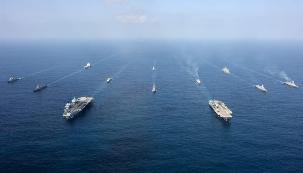 An image from above the see, a fleet of ships together