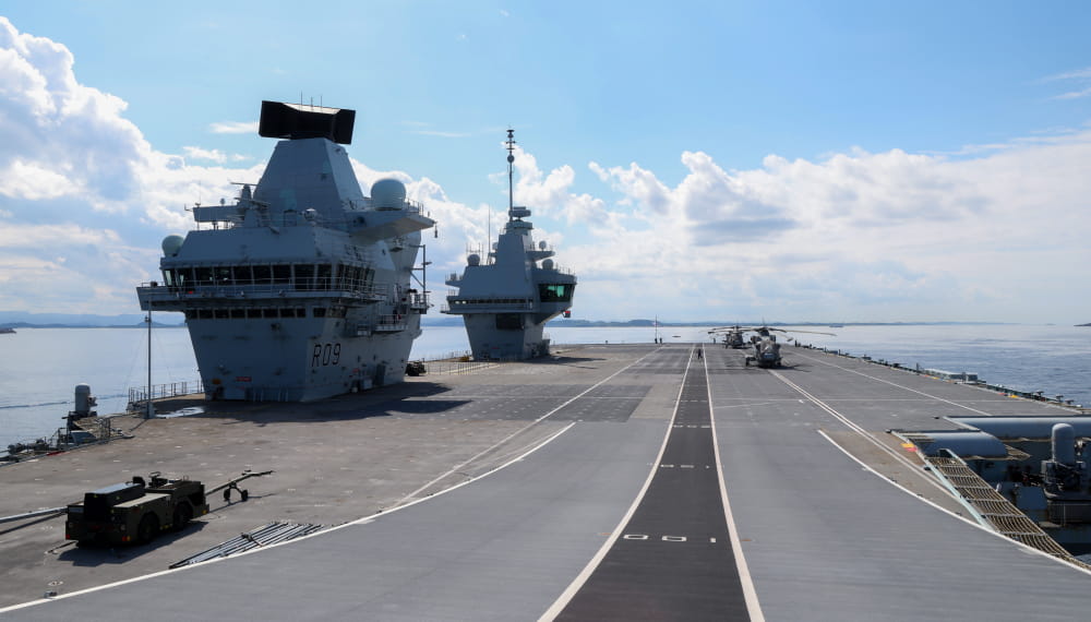 An image of the runway on top of an aircraft carrier