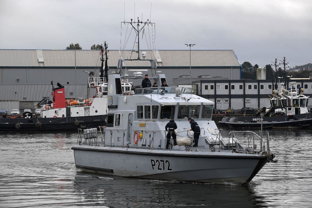 4. FOST Official Photographer, HMNB(D), BOST WK 44/22. HMS SMITER exiting 4 Basin for the Hamoaze