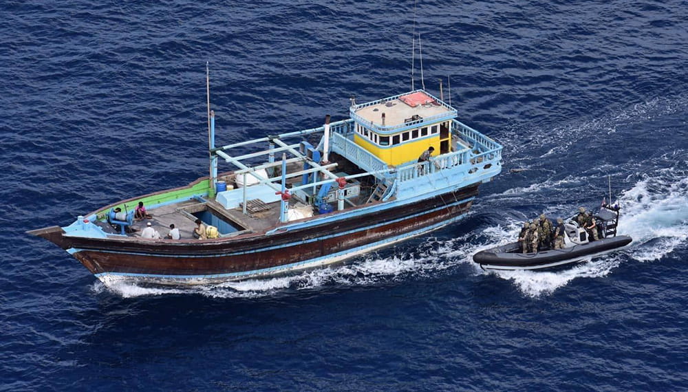 Royal-Navy-What-we-do-protect-02-fighting-crime.jpg Royal Navy rib approaches a boat suspected of drug smuggling