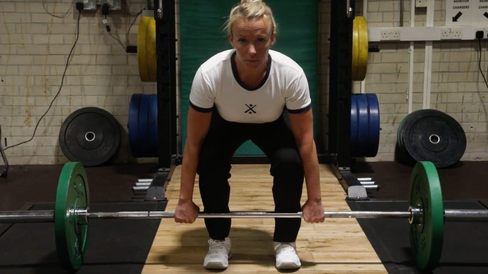 Physical instructor deadlift technique