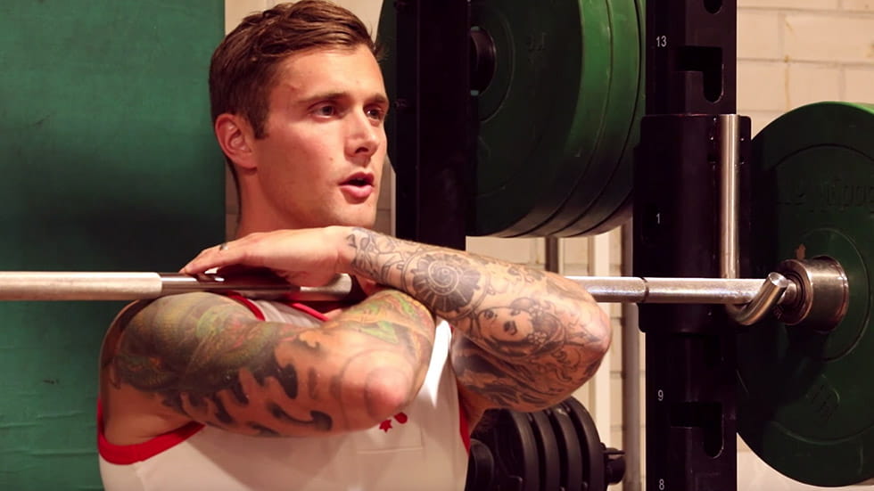 Physical instructor front squat technique