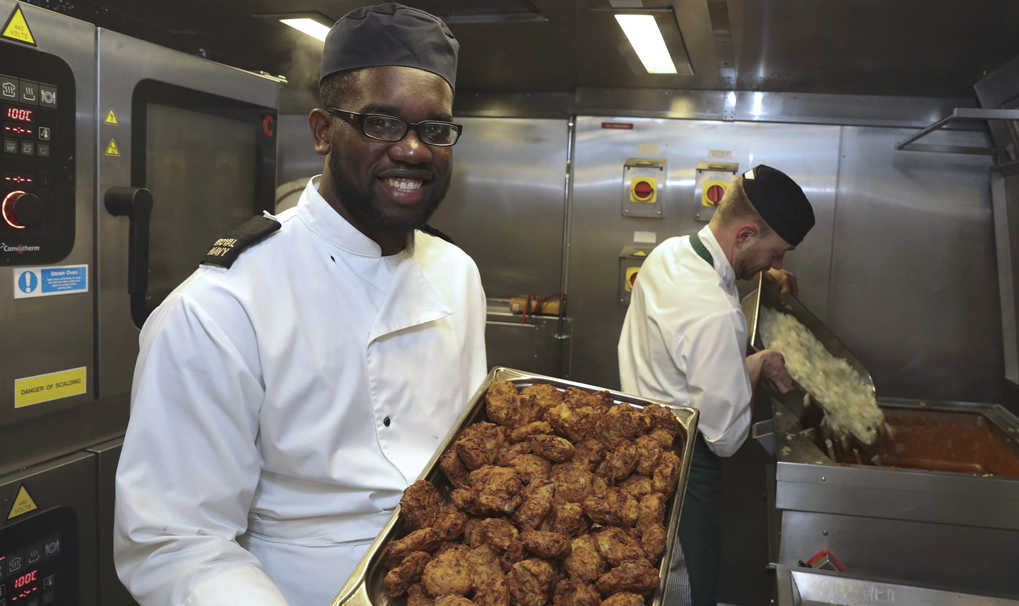 A newly qualified naval chef on his first ship in the galley of the Type 23 frigate HMS Northumberland