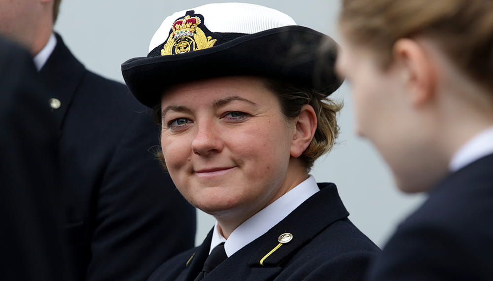 royal-navy-careers-RFA-qualified-officer-02 CNR officer smiles at camera. RFA Lyme Bay hosted a Livery Day to guests as part of the London Internation Shipping Week.