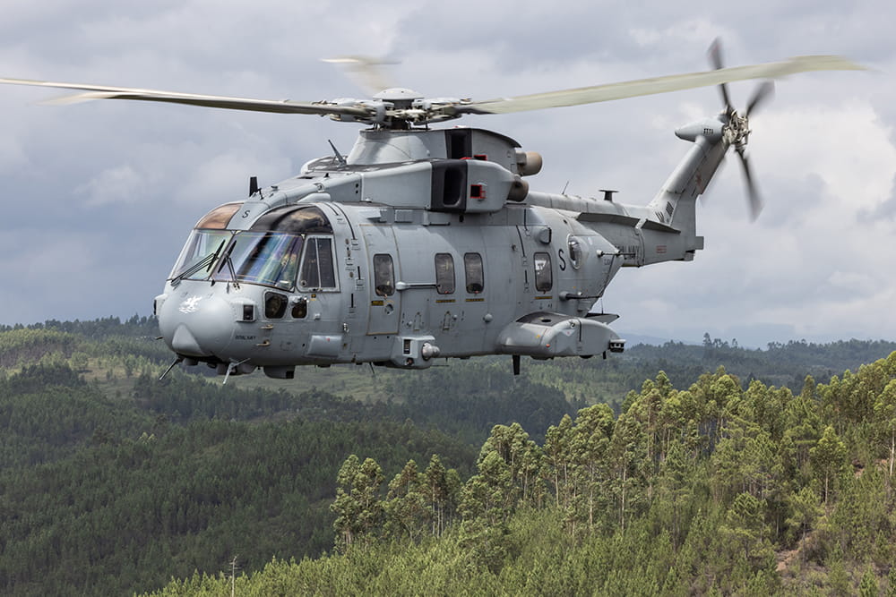 A Merlin MK4 of 846 NAS flying over countryside