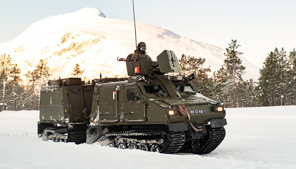 Royal-Navy-Equipment-Commando-By-Land-02-Viking Royal Marines conducting snow and ice driver training with Vikings