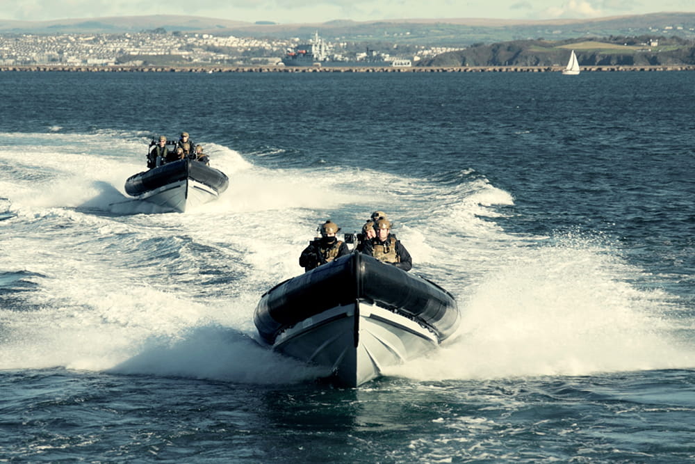 Royal-Navy-Equipment-Commando-By-Sea-03 42 Commando speeding towards camera in a Pac 24 boat