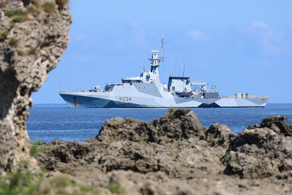 HMS Spey approaches the shores of the Tanna Islands