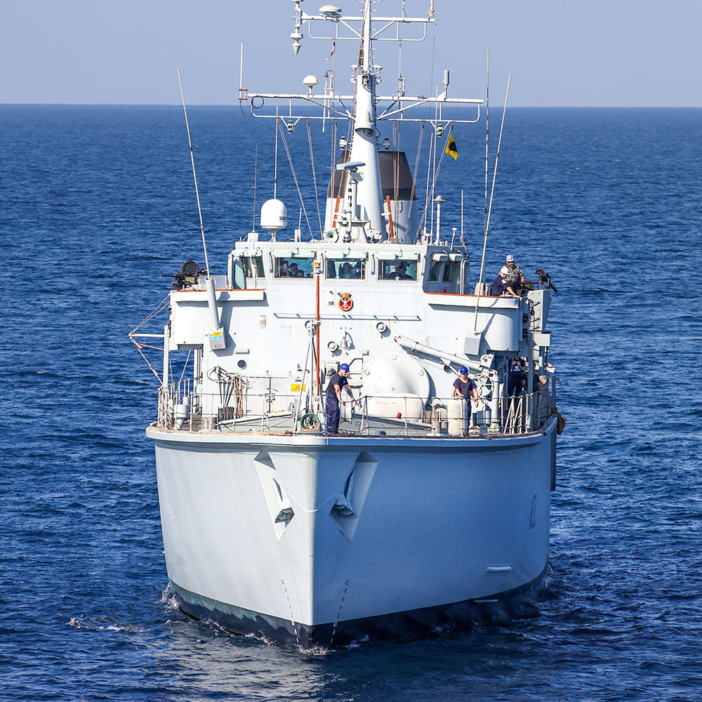 HMS Ledbury approaches the camera 