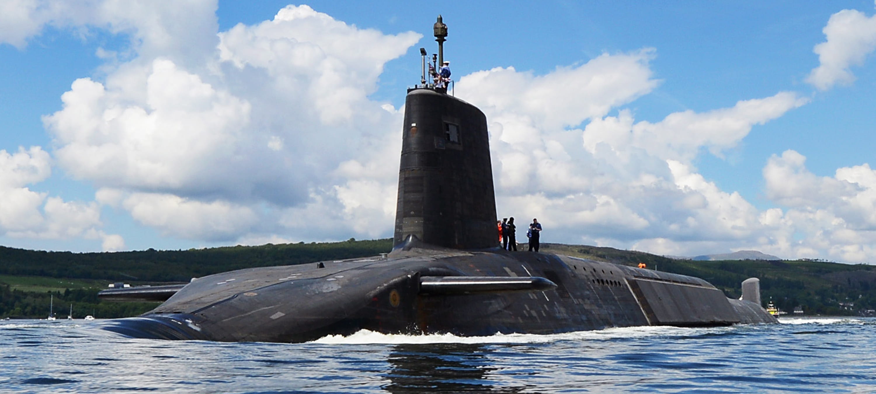 HMS Victorious departs HMNB Clyde under the Scottish summer sunshine