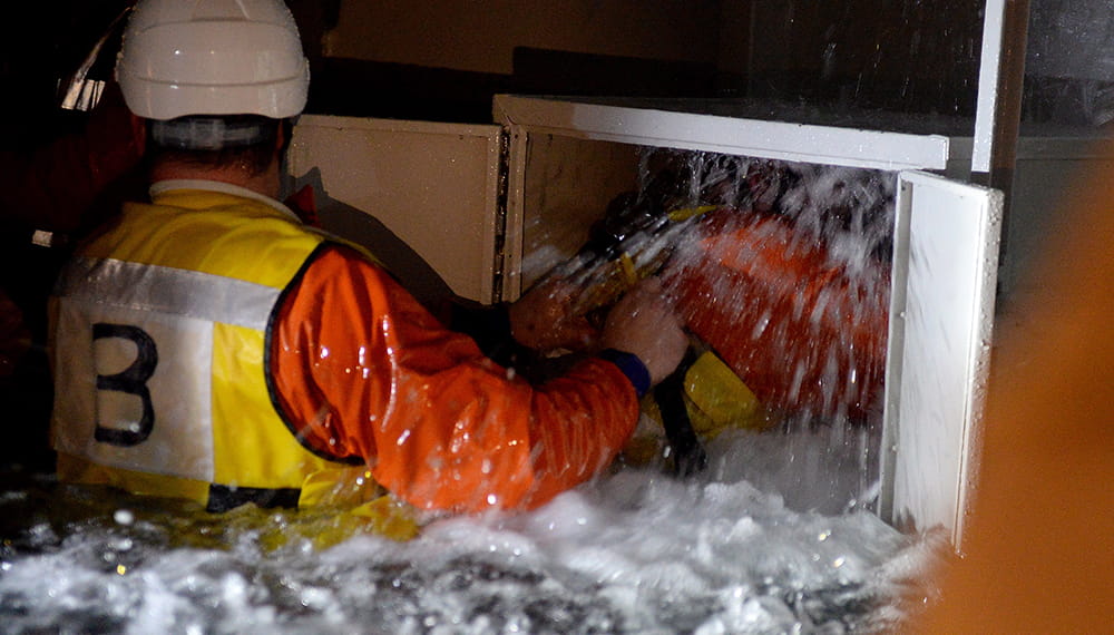 Members of the Bristol Port Company taking the plunge in the simulator