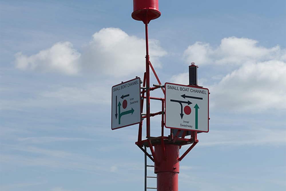 A sign directing ship traffic within the harbour.