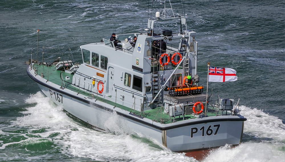 A P167 Archer class vessel driving through the sea