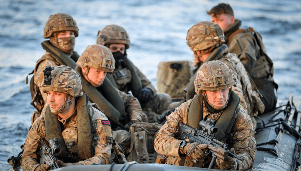 Royal marines on rib boat approaching camera