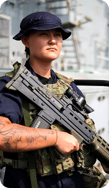 woman with gun