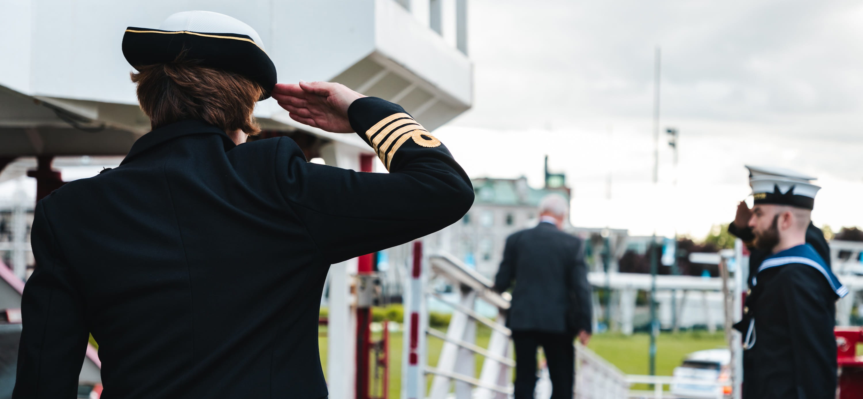 The Commanding Officer of HMS Protector Captain salutes the Lieutenant Governor of Quebec