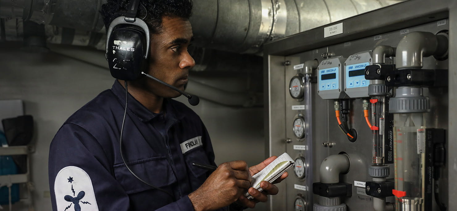 HMS Defender's Marine Engineering Department carry out their daily maintenance checks.